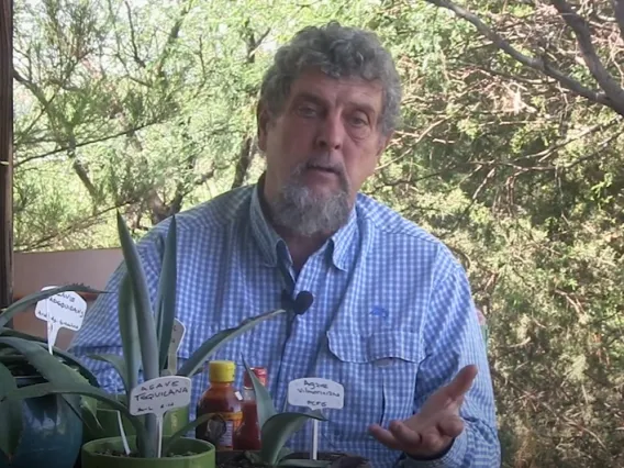 Gary Nabhan in front of some native plants