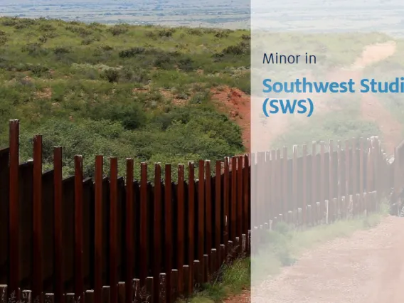 Picture of the US Mexico Border with rolling hills and mountains in the background