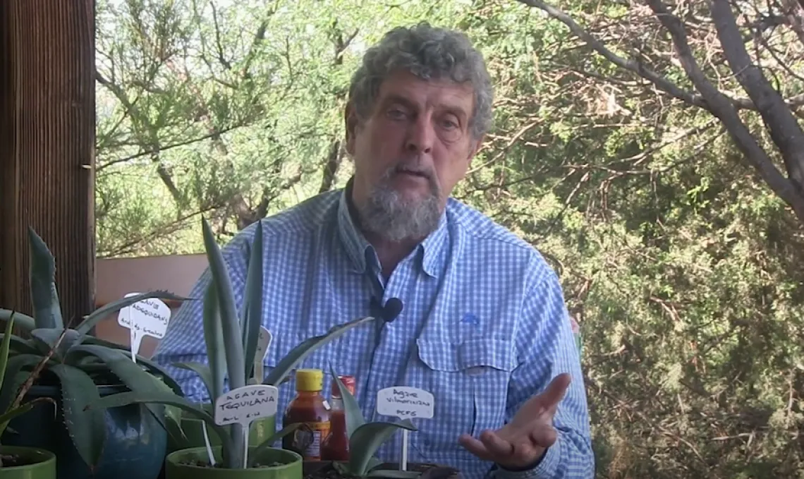 Gary Nabhan in front of some native plants