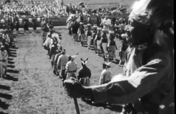 Archival photograph of Native Americans in traditional dress