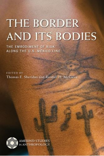 Book cover showing desert tatoos